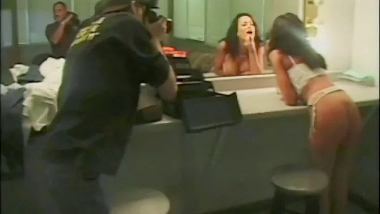 Bombshell Poses For Camera Before Shooting A Scene 